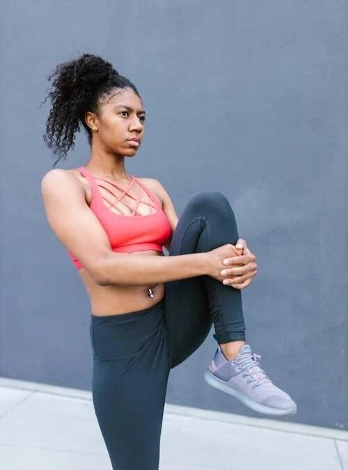 An image of a woman warming up before exercise