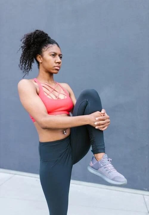 An image of a woman warming up before exercise