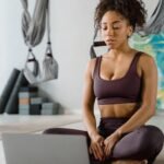 An image of a woman starting her online workout class